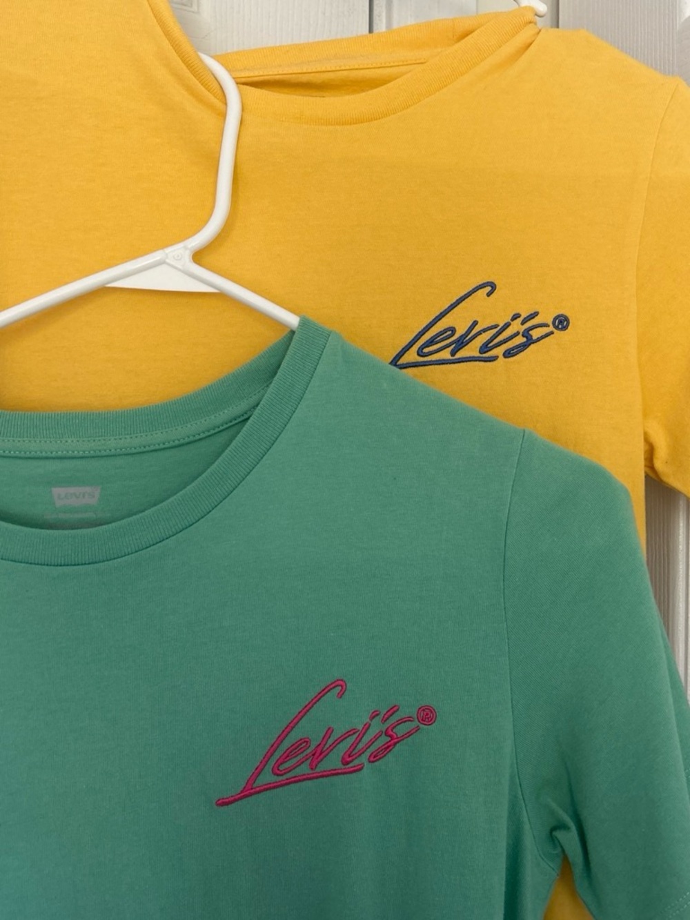 BUNDLE : two Levi's tees, green and yellow with cursive style logo